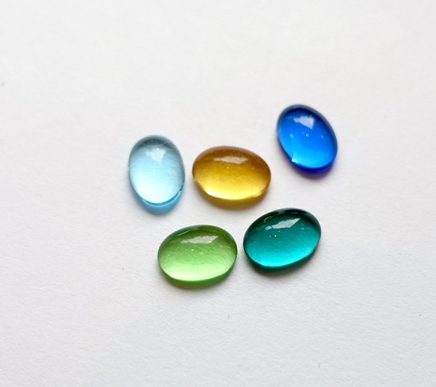48 cabochons 7x5mm oval transparent Farb mix